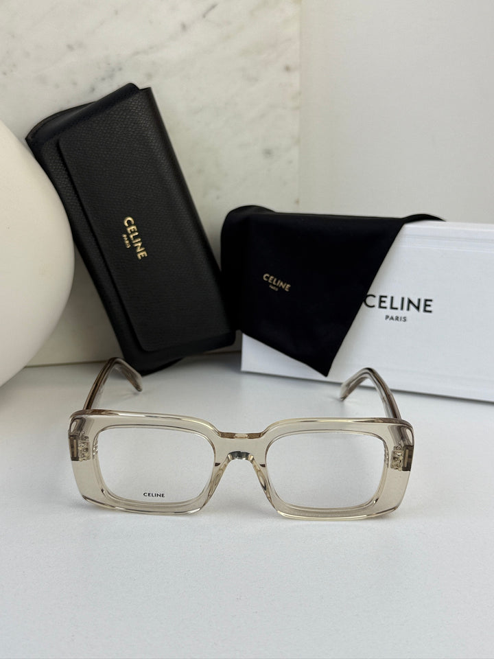 Celine rectangular eyeglass frames, translucent clear front with gold-tone metal bridge