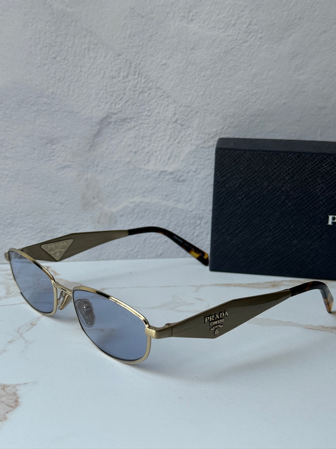 Prada PR D51S Metal Oval Sunglasses in Gold Blue