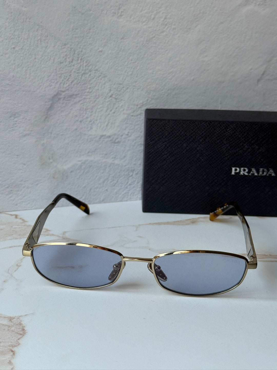 Prada PR D51S Metal Oval Sunglasses in Gold Blue