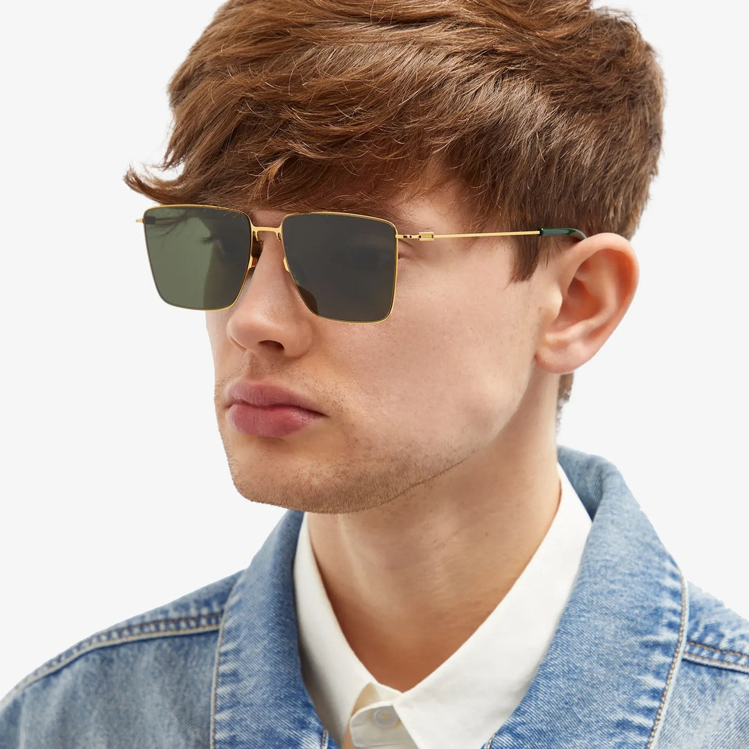 Bottega Veneta BV1267S gold sunglasses worn, dark green square lenses