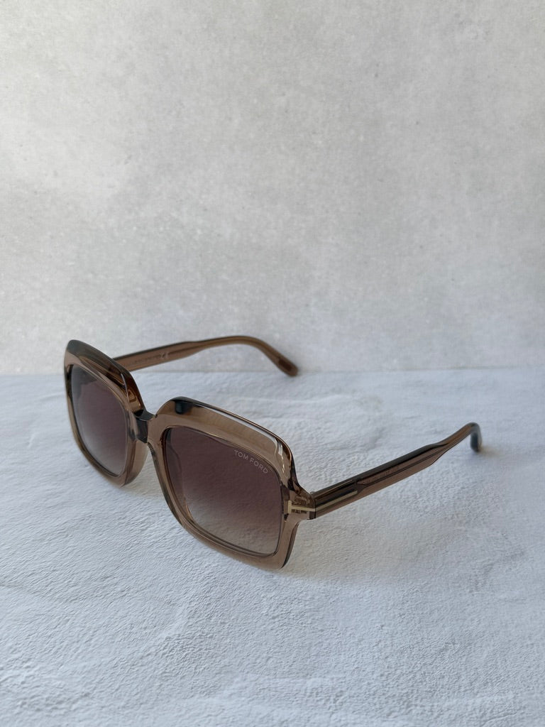 Rectangular sunglasses with translucent frame and tinted lenses, angled view