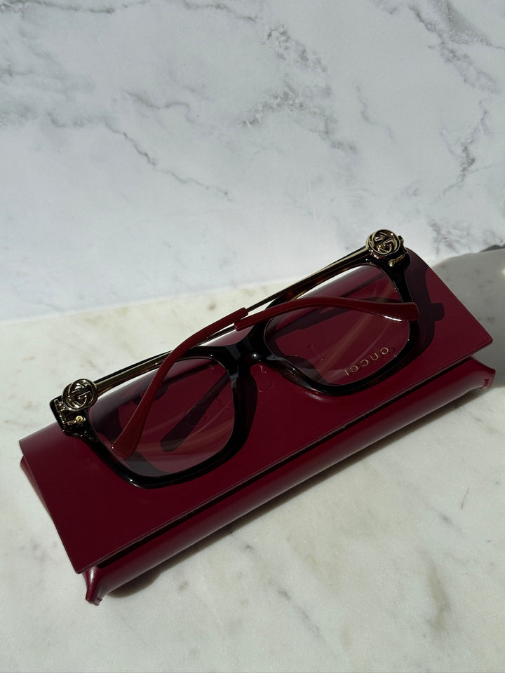 Gucci Havana brown eyeglasses, side view with gold temples and logo