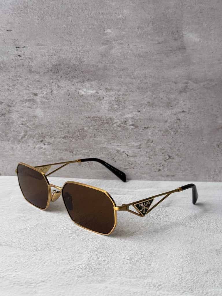 Gafas de sol Prada PR A51S en dorado rosa 