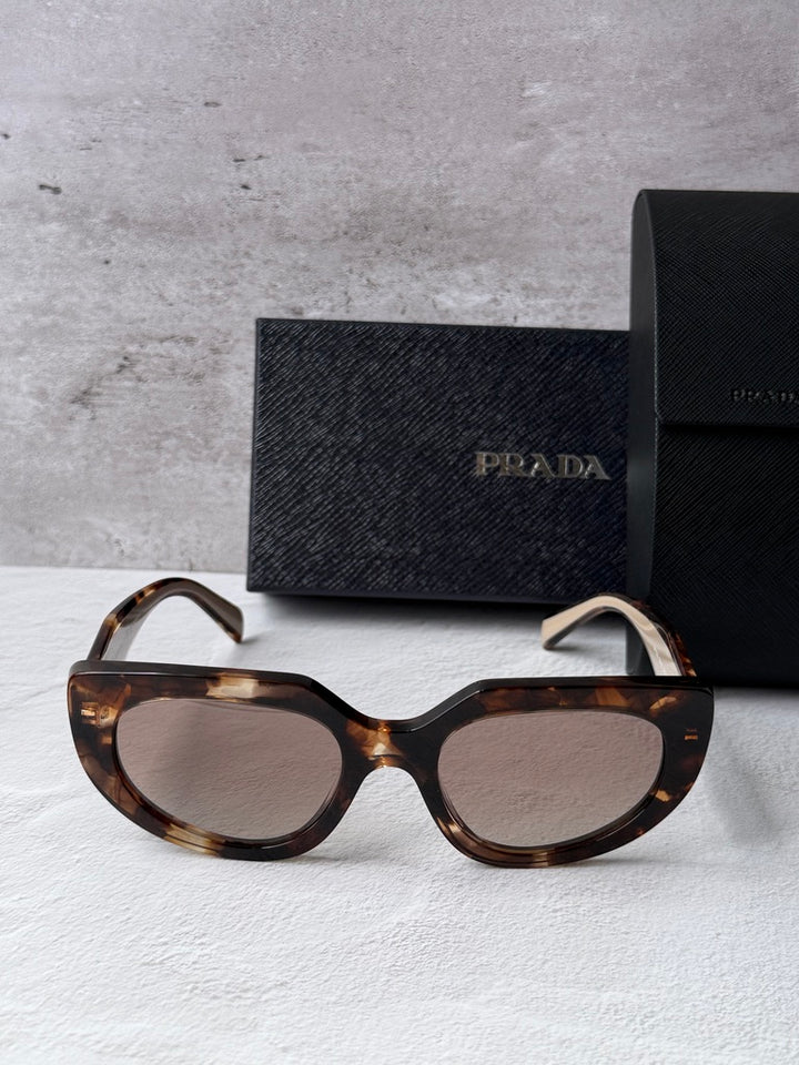 Prada cat-eye sunglasses, Havana powder frames with brown tinted lenses