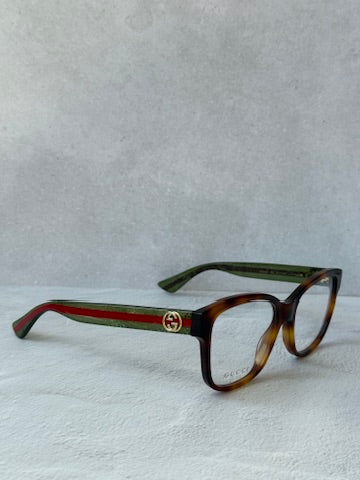 Monturas de anteojos Gucci GG0038ON con patas a rayas marrones