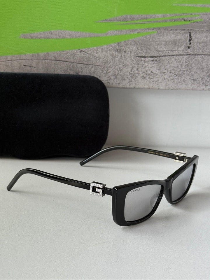 Gafas de sol negras con mariposa y logo Marmont de Gucci GG0765SA