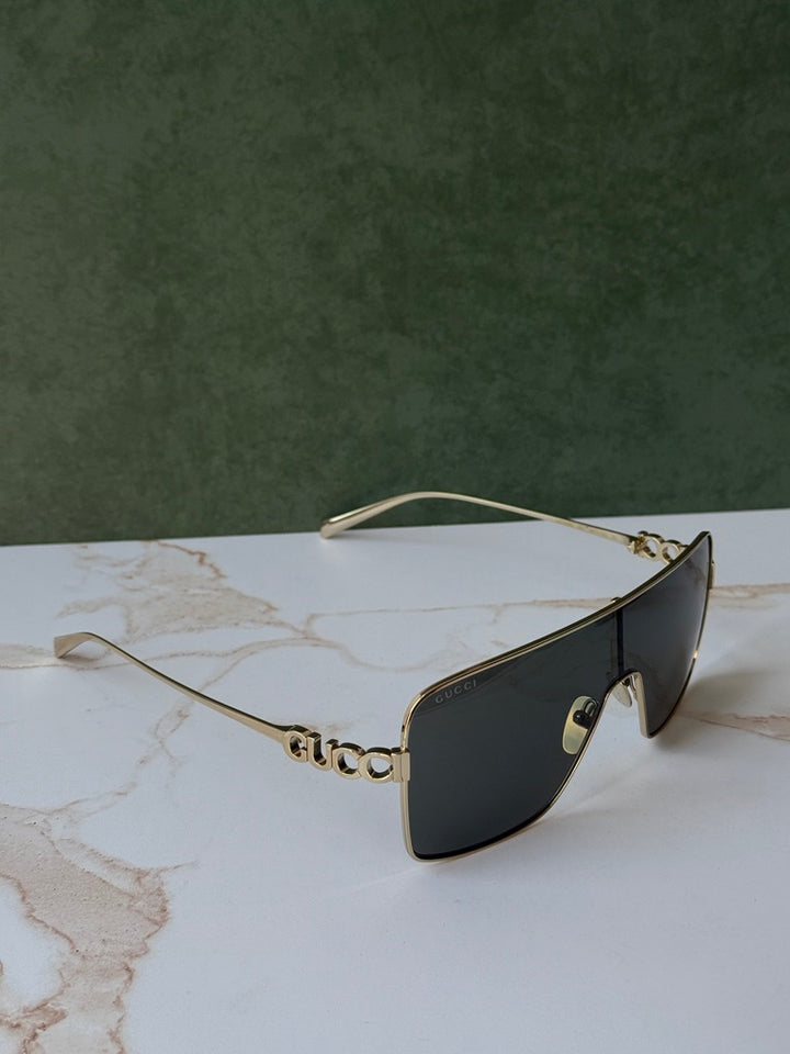 Gafas de sol extragrandes Gucci GG0817S con lentes grises 