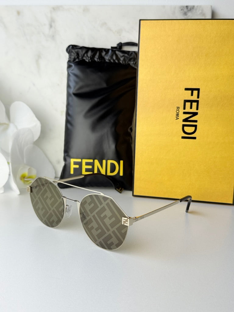Round gold metal frame sunglasses with mirrored lenses and FF logo pattern