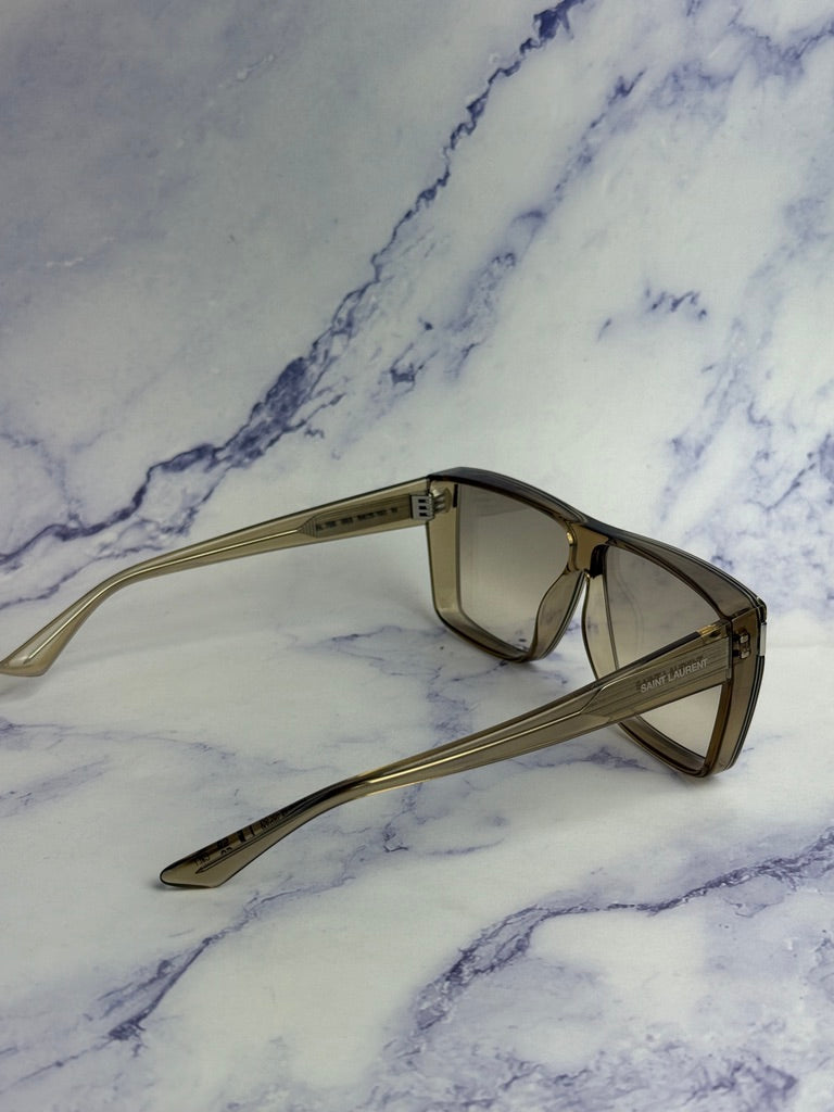Beige flat-top sunglasses with light-tinted lenses and extended temples