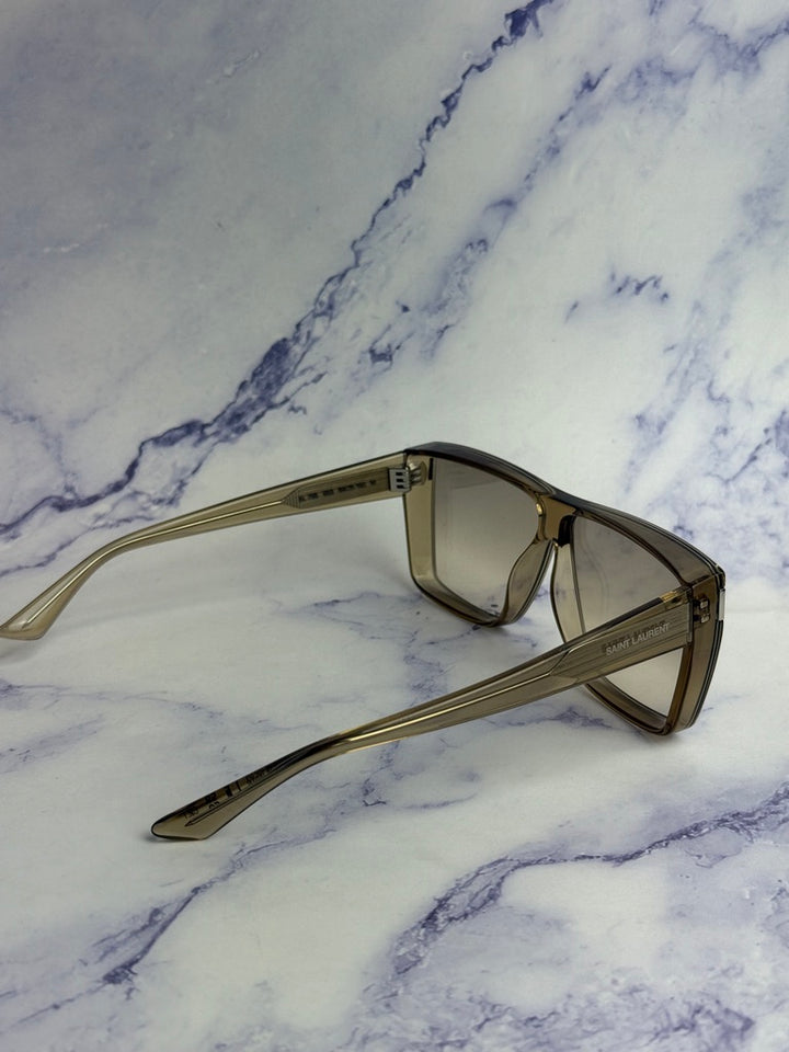 Beige flat-top sunglasses with light-tinted lenses and extended temples