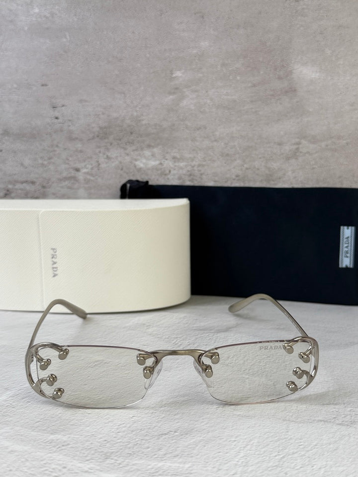 Prada PR C57S Rimless Sunglasses in Silver Bluelight