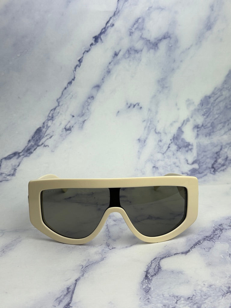 Gucci GG1257S Gafas de sol redondeadas con lentes marrones y rojos