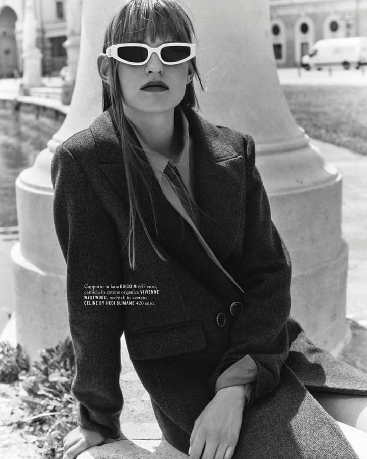 Celine Triomphe white sunglasses with dark lenses on face
