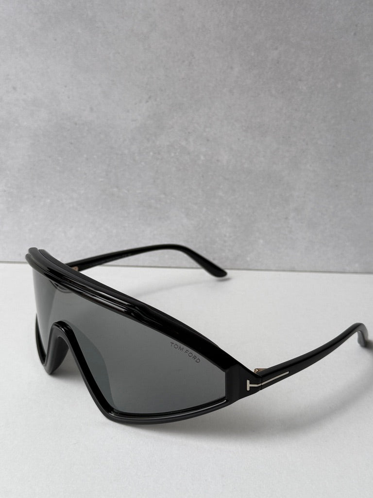 Black mirror sunglasses with dark lenses and logo on temple