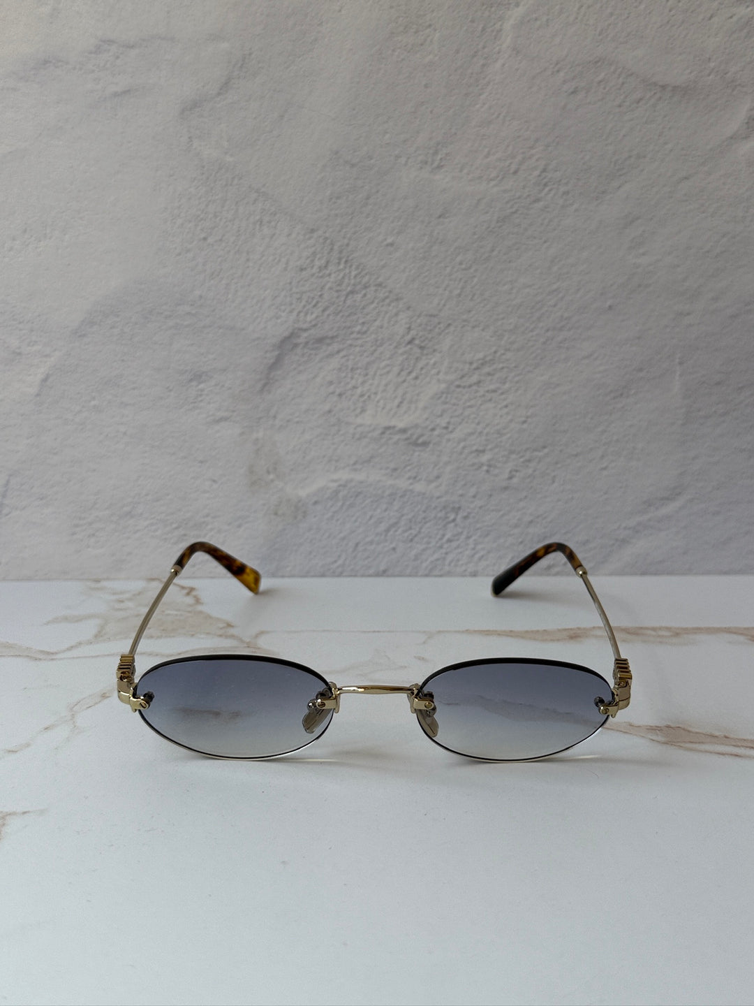 Miu Miu MU A54S Gold Blue Oval Rimless Sunglasses