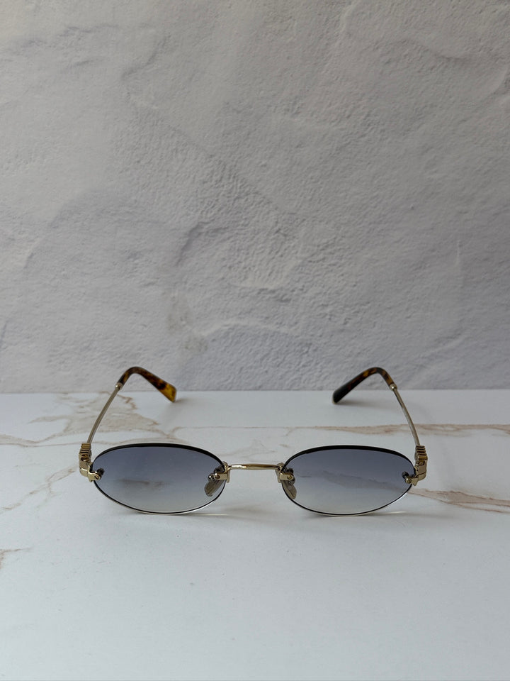 Miu Miu MU A54S Gold Blue Oval Rimless Sunglasses