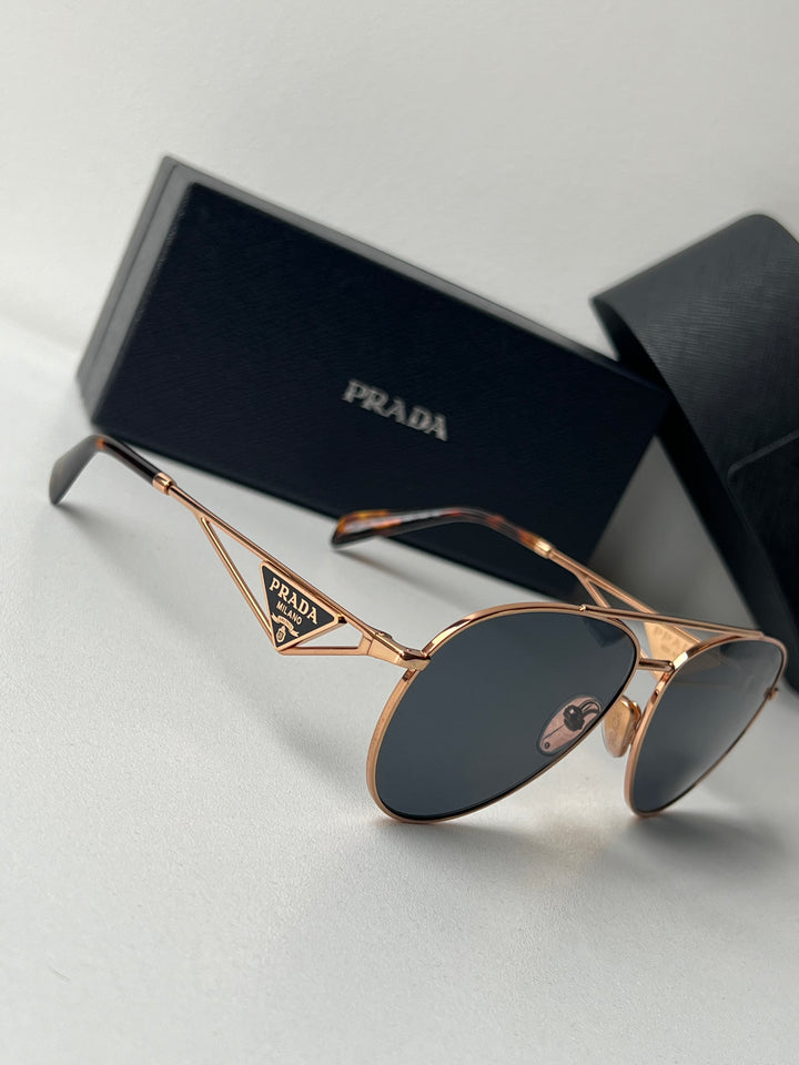 Gafas de sol Prada PR73ZS en oro rosa 