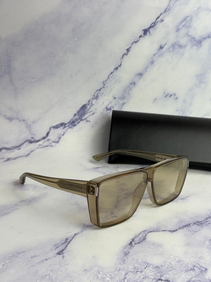 Beige flat-top sunglasses with gold-tone frame and light-tinted lenses