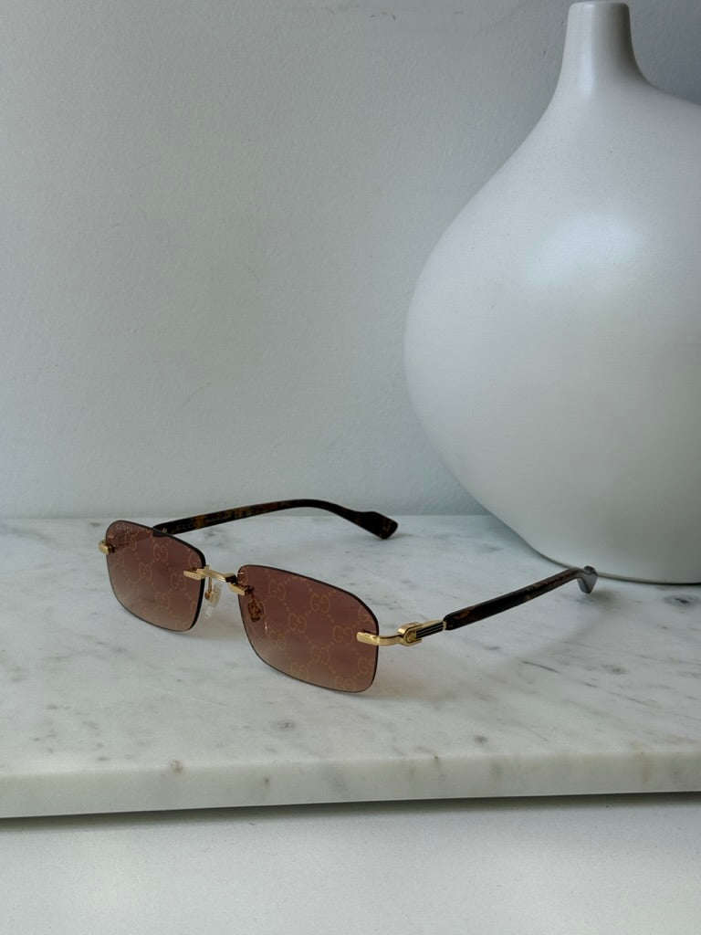 Gucci GG1221S Brown Monogram Rimless Sunglasses