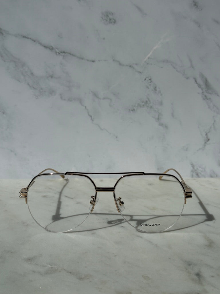 Gold aviator eyeglass frames with clear lenses, front view