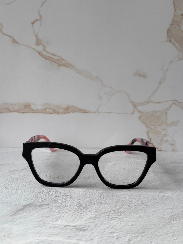Monturas estilo ojo de gato Gucci GG1424O en negro 