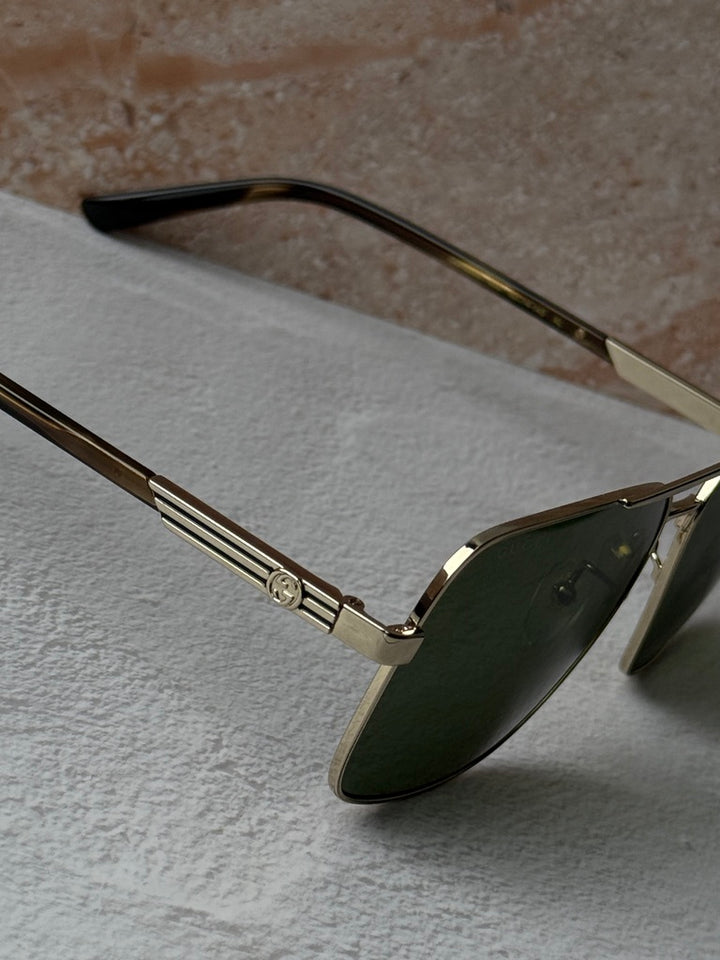 Gafas de sol de aviador doradas Gucci GG1289S