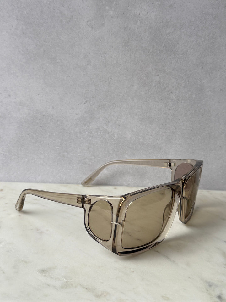 Rizzo grey sunglasses angled view with tinted lenses and metal frame