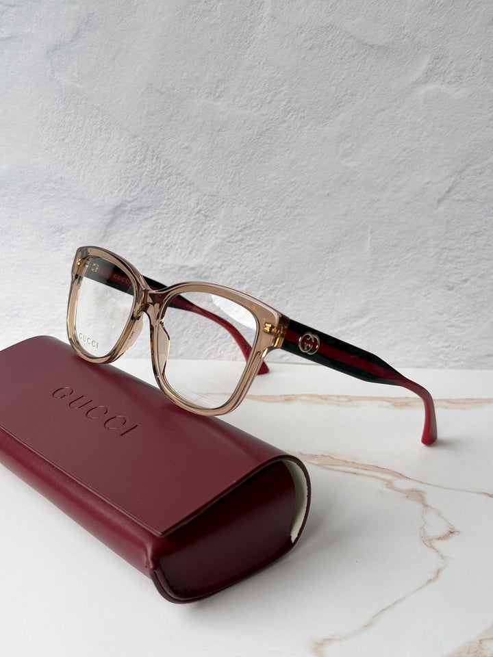 Monturas de anteojos Gucci GG0038ON con patas a rayas negras