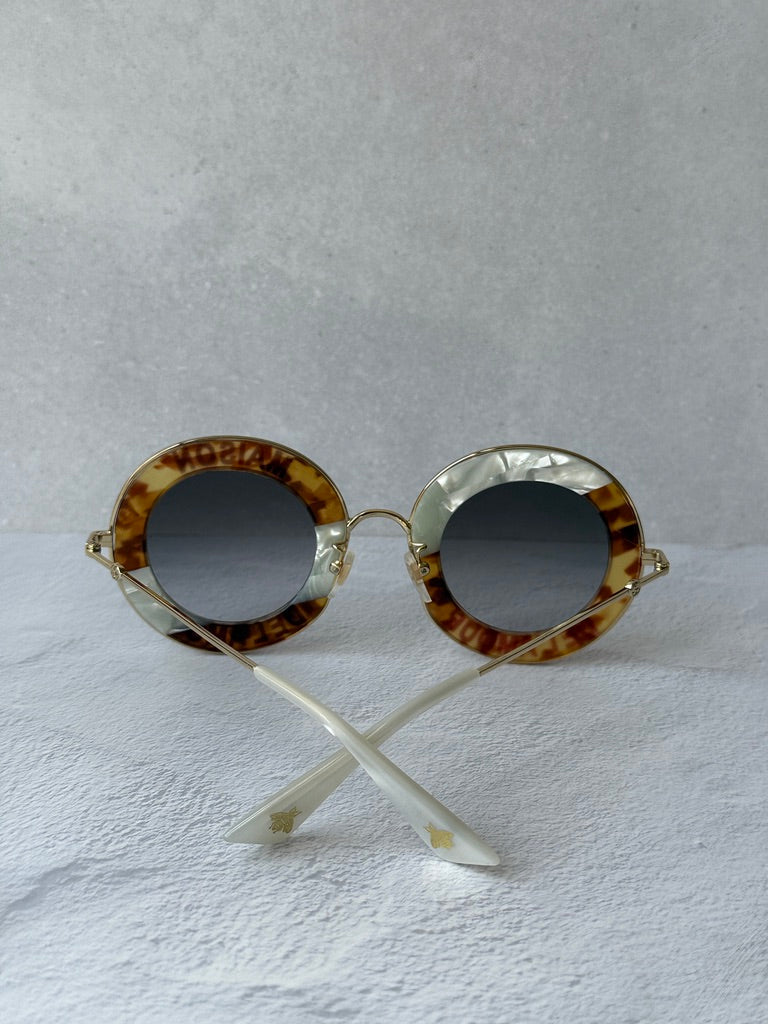 Gucci GG0113S Blind For Love Gafas de sol redondas negras