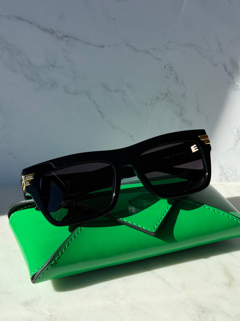 BV1058S black rectangular sunglasses with dark lenses and gold bar accents