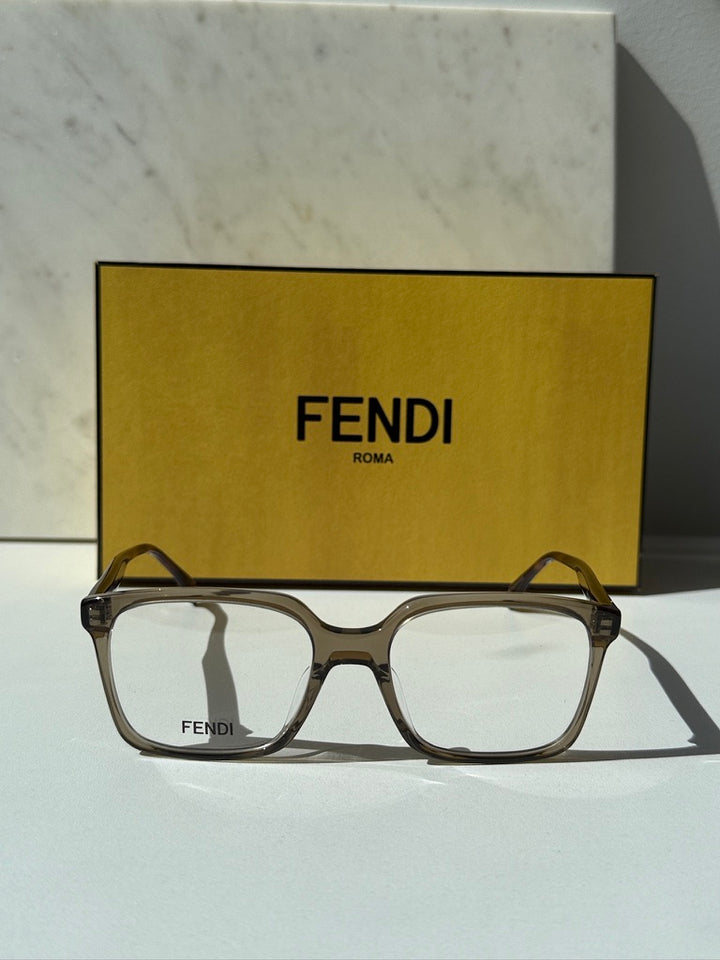 Unisex Fendi transparent brown rectangular eyeglass frames, front view