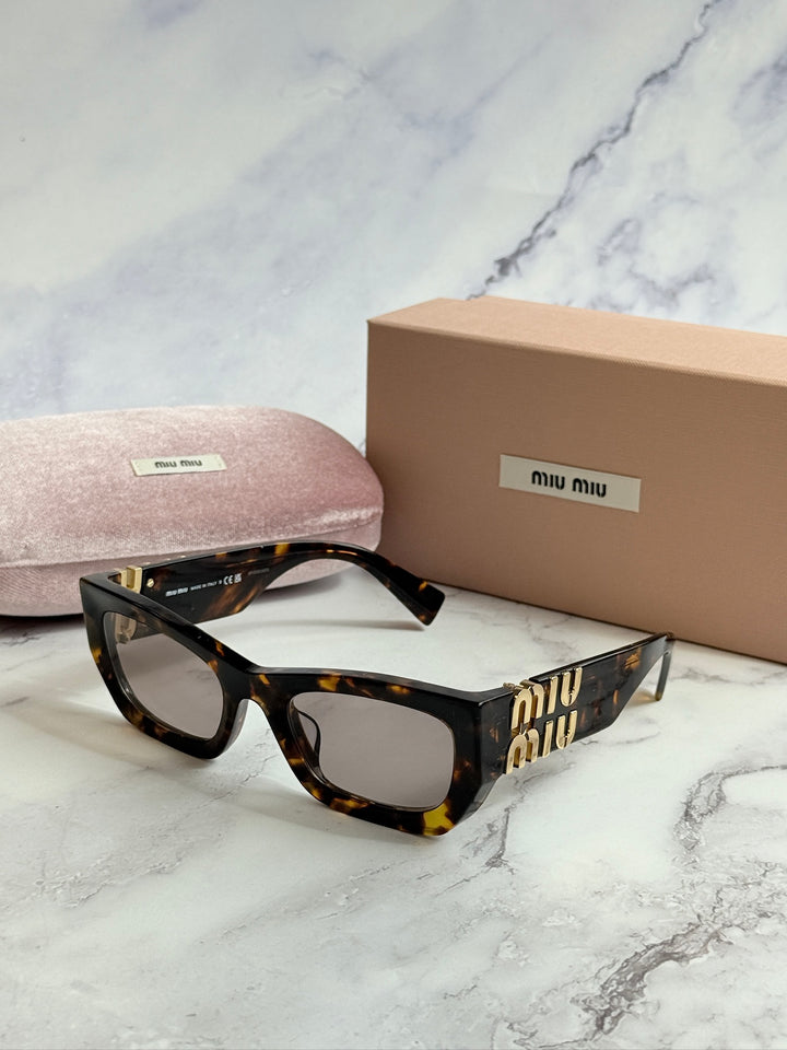 Miu Miu MU09WS Honey Brown Purple Cat Eye Sunglasses
