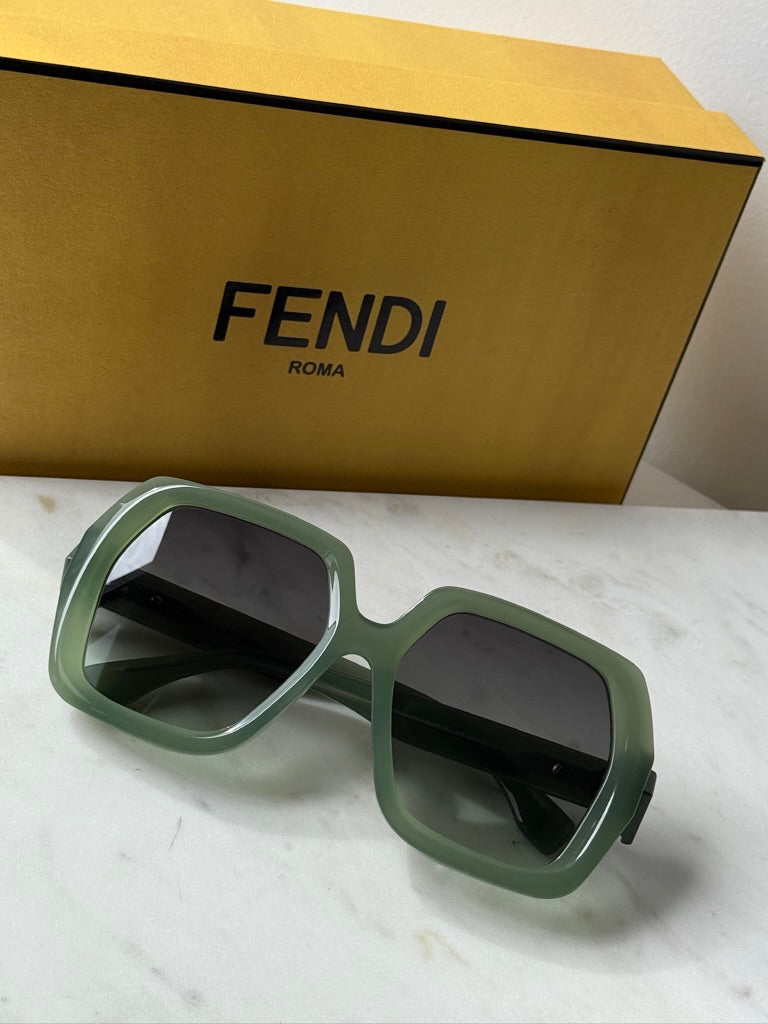 Fendi green oversized sunglasses with square frames and dark tinted lenses