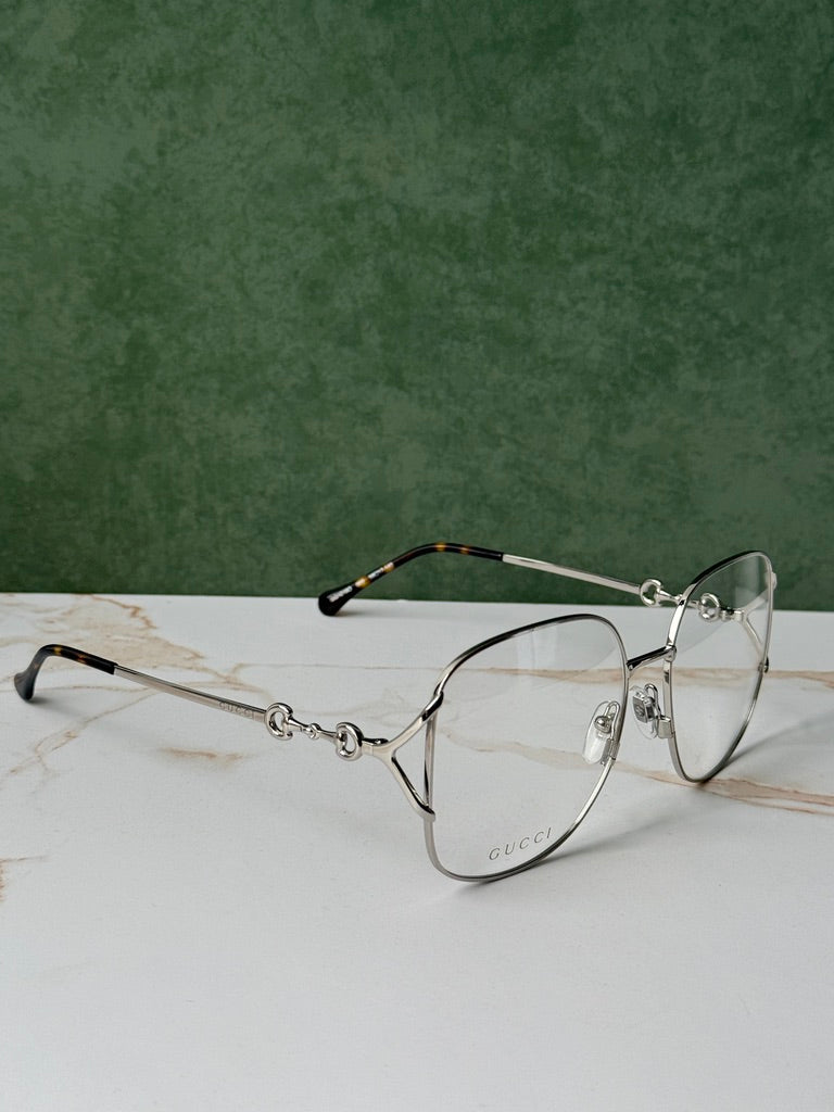 Gucci GG0973O Marcos de metal plateado