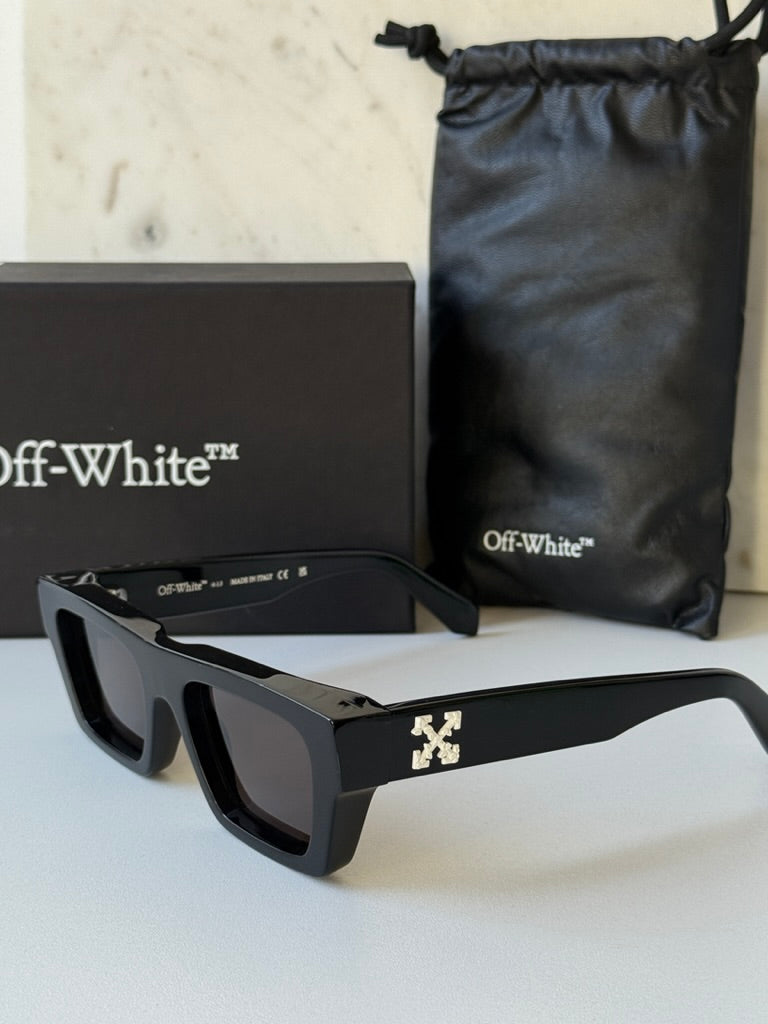 Black sunglasses with dark lenses and Off-White logo, shown with pouch and box