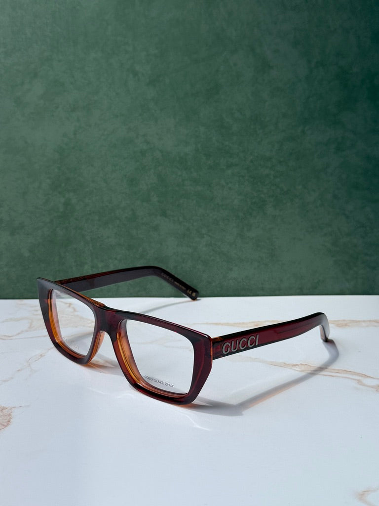 Dark red-brown Gucci eyeglass frames, side view