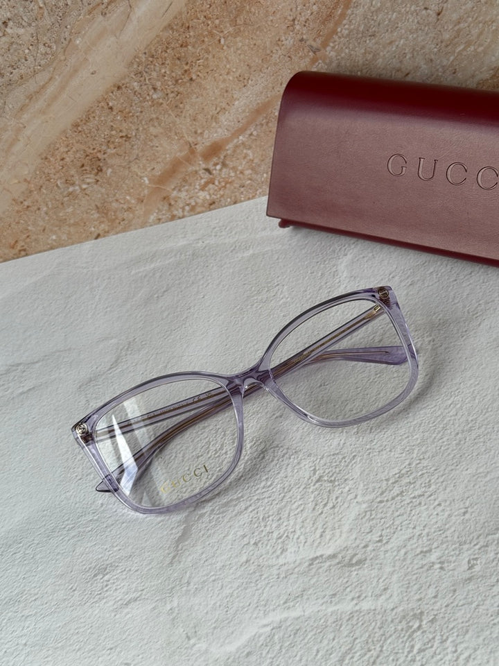 Monturas de anteojos estilo ojo de gato cuadrados desnudos Gucci GG0026O