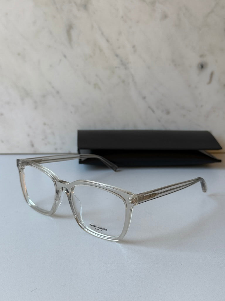 Clear rectangular eyeglass frames, angled view showing side profile and temples