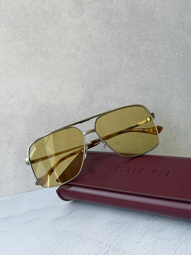 Gafas de sol estilo piloto extragrandes Navigator con lentes amarillas Gucci GG1099SA