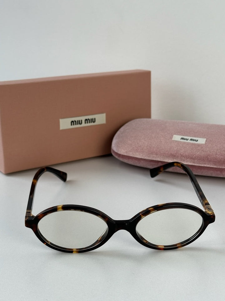 Miu Miu MU04ZSF Light Havana Bluelight Sunglasses