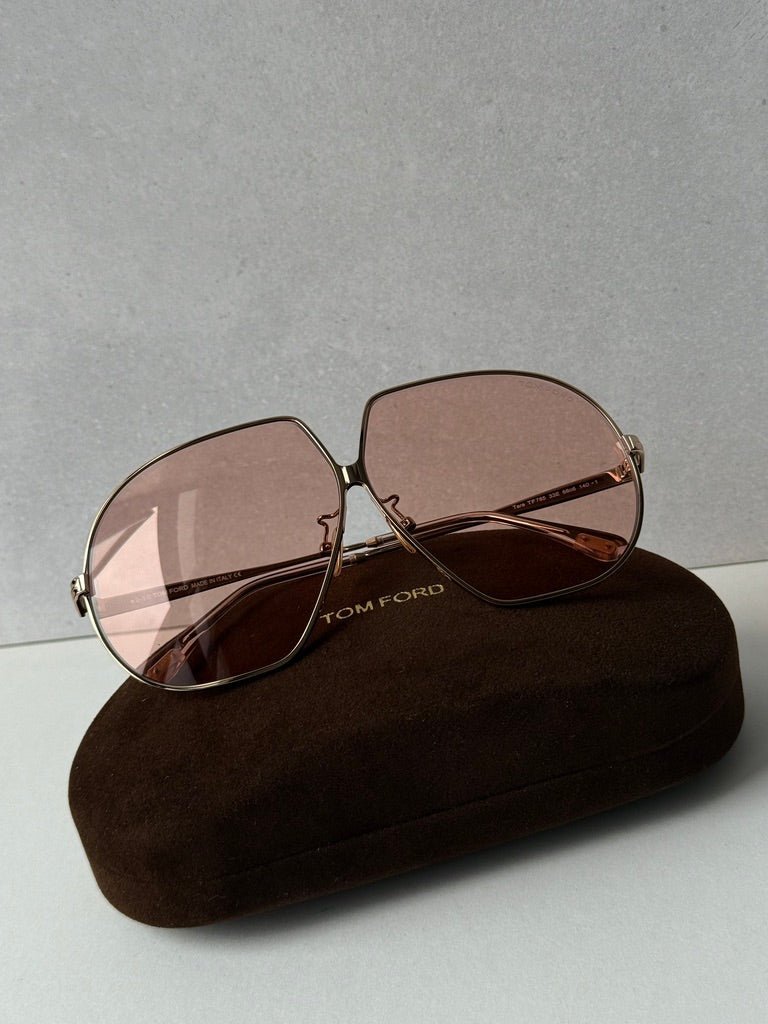 Rose gold oversized sunglasses with rose-tinted lenses, metal temples, TOM FORD logo