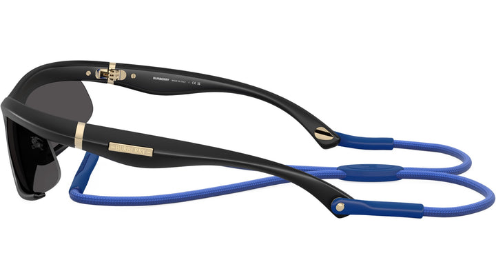 Burberry sunglasses side view with black frame and blue strap cords