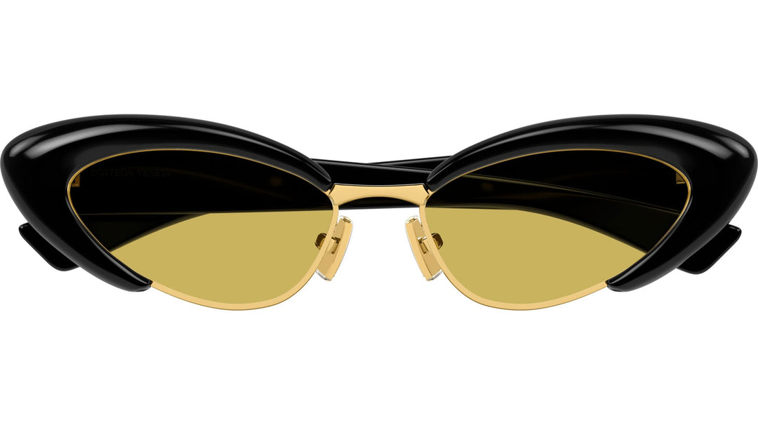 Cat-eye sunglasses with glossy black frame, gold bridge and arms, amber tinted lenses