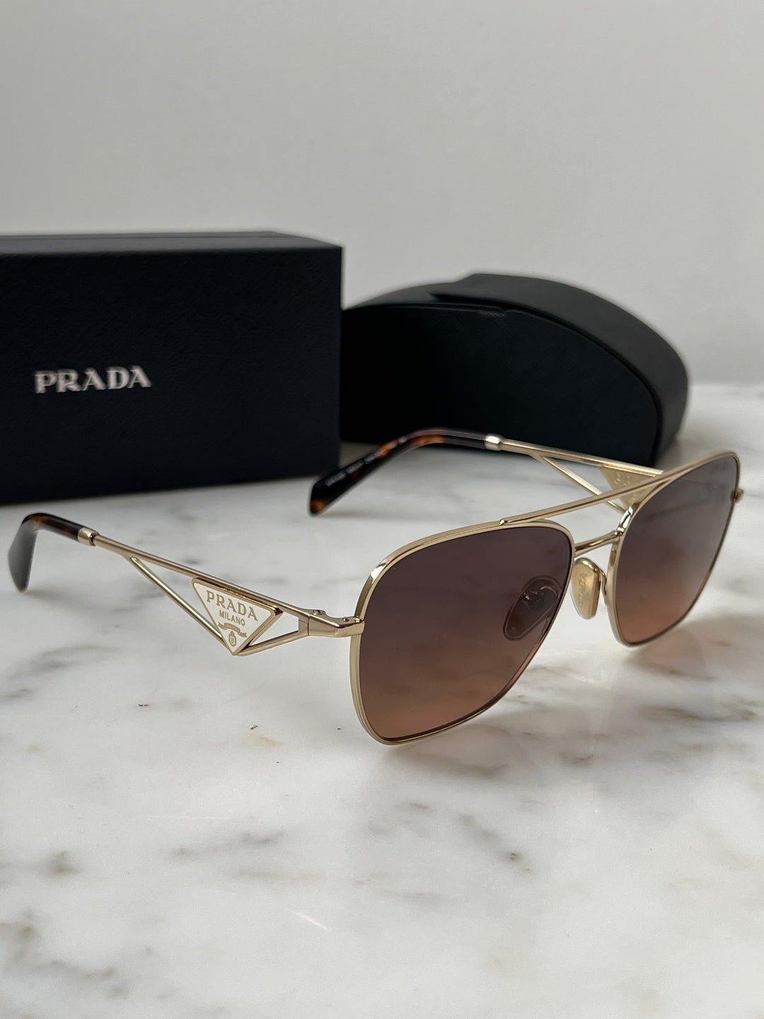 Prada PR A50S Sunglasses in Gold Brown