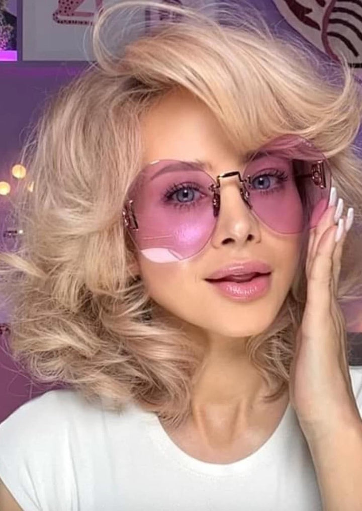 Gucci GG1203S Gafas de sol sin montura con cadena dorada violeta