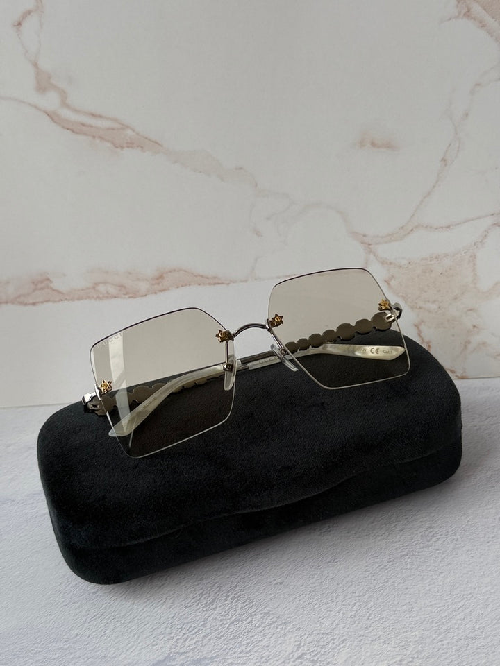 Gucci GG0644S Silver Rimless Star Lens Crystal Sunglasses