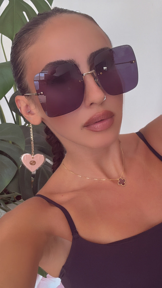 Gafas de sol cuadradas sin montura Gucci GG1147S con cadena verde 