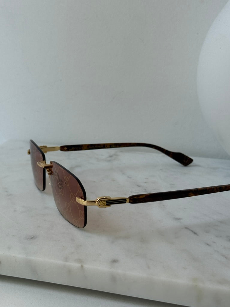 Gucci GG1221S Brown Monogram Rimless Sunglasses