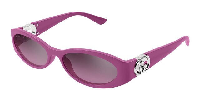 Gucci pink oval sunglasses with dark tinted lenses and logo hardware on temples