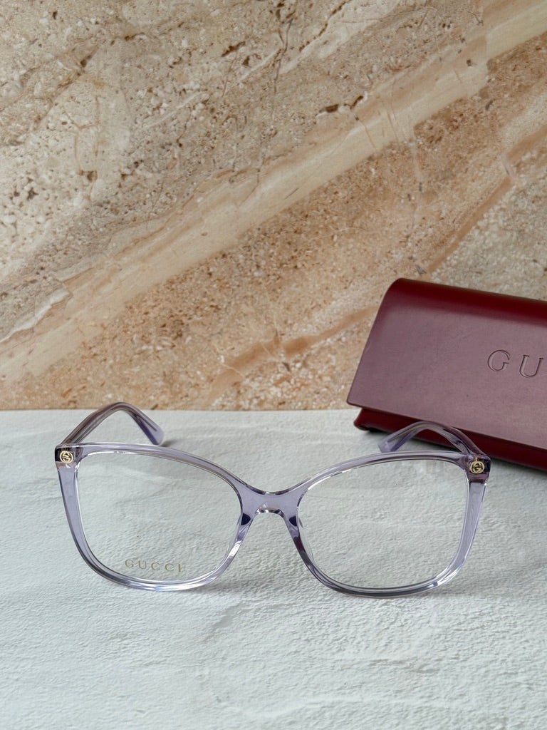 Monturas de anteojos estilo ojo de gato cuadrados desnudos Gucci GG0026O